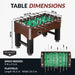 Hathaway Primo 56-inch foosball table dimensions labeled as 56.5 inches long, 29 inches wide, and 34 inches high; requires 9 ft by 9.5 ft of floor space with a 46.5 in x 26.5 in playfield.