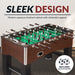 Hathaway Primo foosball table with modern espresso-finished cabinet and chrome accents; includes two 36-mm soccer-style foosballs for classic gameplay appeal.
