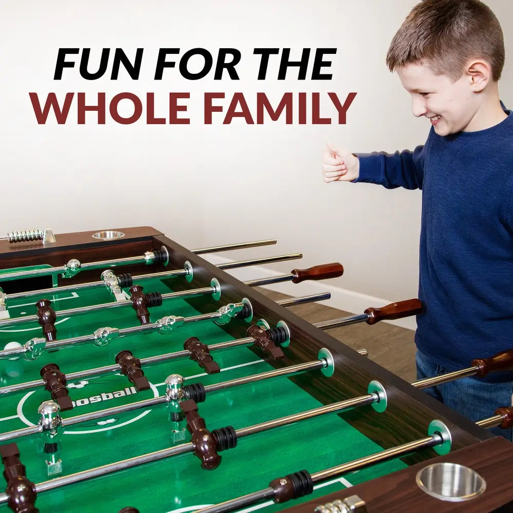 Smiling young boy giving a thumbs up while playing on the Hathaway Primo foosball table, emphasizing its fun, family-friendly design and engaging gameplay.