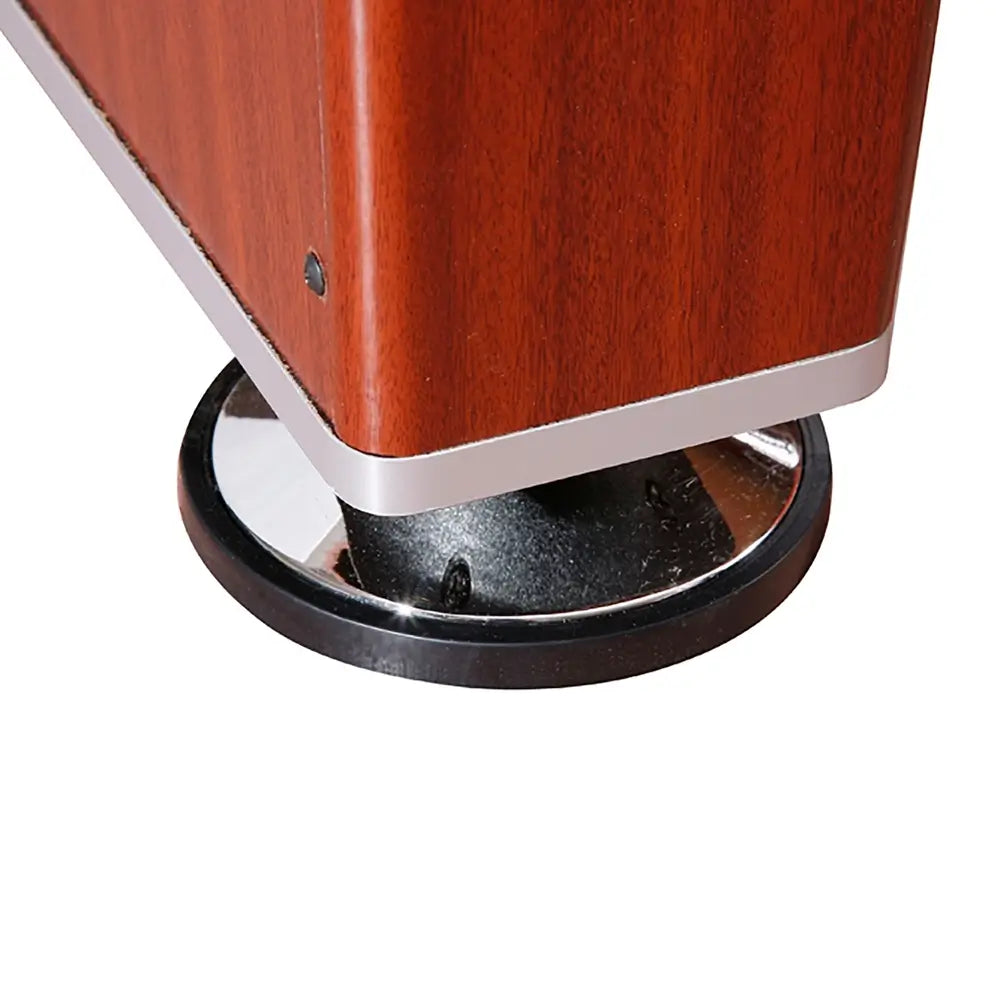 Close-up of the adjustable leg leveler on the bottom of the air hockey table. Leg base features a shiny black plastic finish and supports the wood-paneled leg structure.