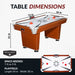 Air hockey table dimensions chart showing full table size of 72 inches long, 36 inches wide, and 31 inches high. Playfield dimensions are 64 inches by 30 inches. Image includes space requirement note of 7 to 9 feet. Features wood grain cabinet, chrome corner accents, and digital scoreboard. Brand: Hathaway.