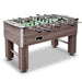 Hathaway Driftwood 56-in foosball table featuring weathered gray wood finish, chrome accents, and durable construction with dual leg bars.