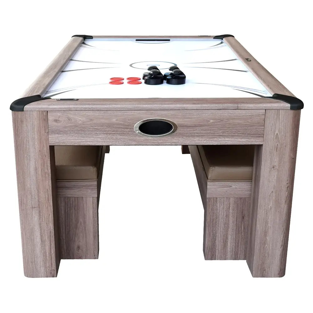 Air hockey tabletop with built-in goals and arcade-style markings, tan cushioned benches tucked underneath for space-saving design.
