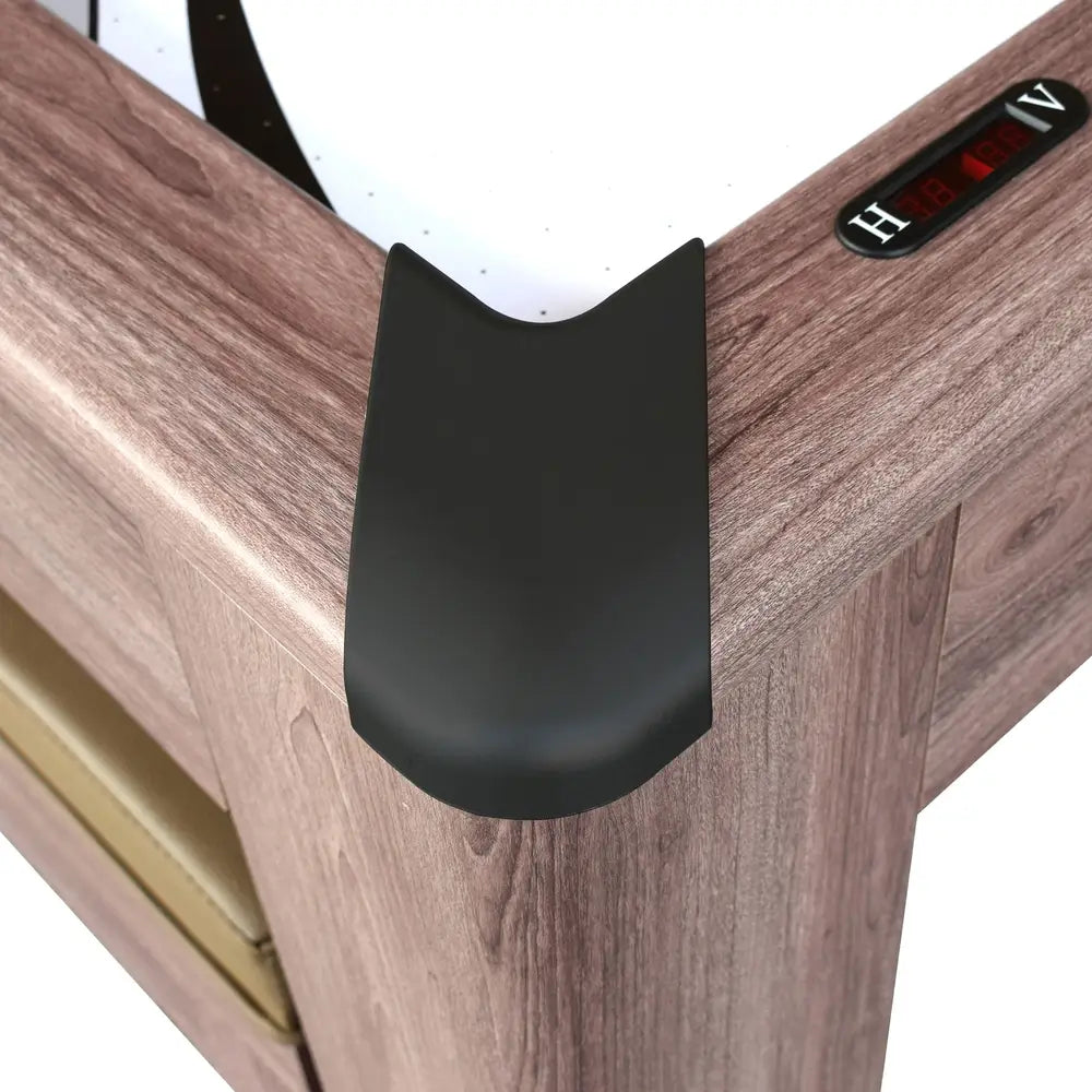 Corner detail of wood-style air hockey table with black protective corner cap and built-in electronic scoreboard for home game rooms.