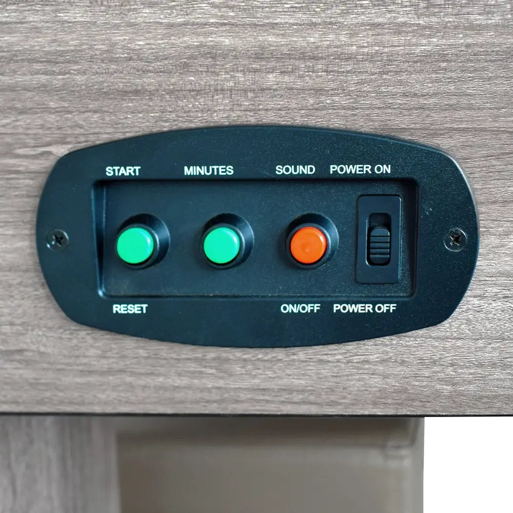 Control panel with labeled push buttons for start, reset, minutes, sound on/off, and power toggle switch, mounted on wood grain table surface.