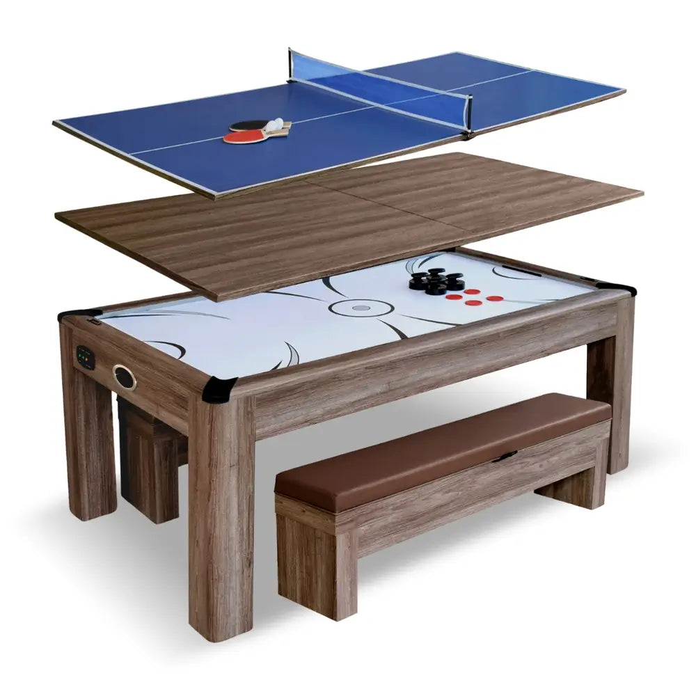 Exploded view of 3-in-1 convertible game table showing layered design with blue ping pong top, wooden dining top, and air hockey surface with benches.