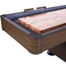 Close-up view of shuffleboard table’s carpeted gutter and integrated abacus scorer next to a 1.5-inch thick hardwood butcher block surface