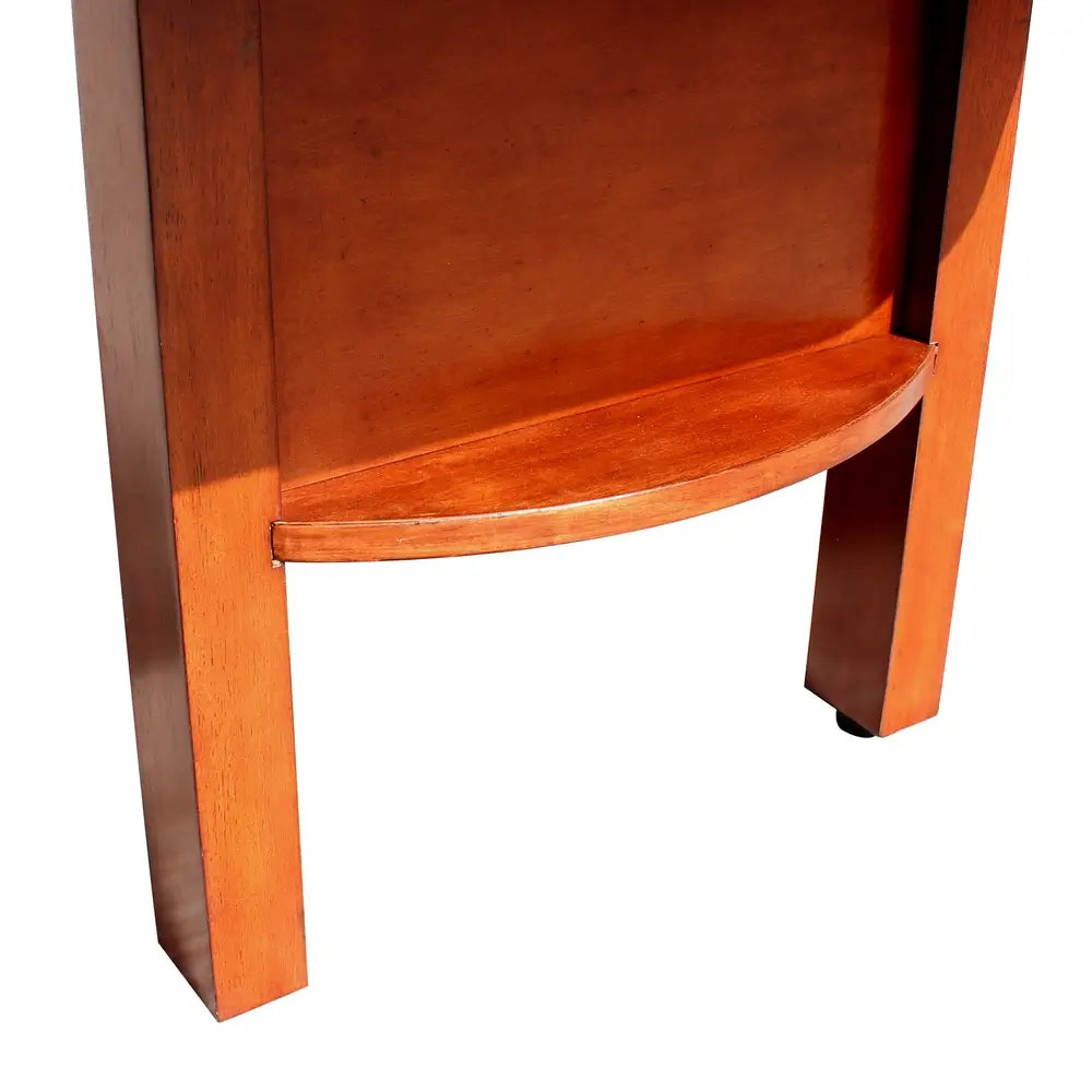 Close-up of lower leg shelf and curved wood detailing on Hathaway Merlot shuffleboard table in warm cherry wood finish.