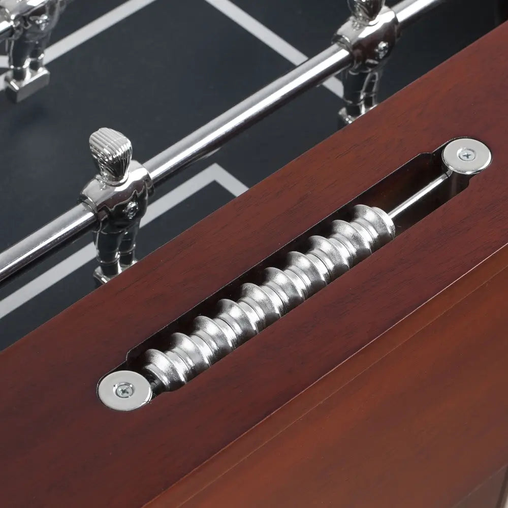 Zoomed-in view of dual abacus-style chrome scorekeeper set into the wood frame of the foosball table, for accurate and stylish goal tracking.