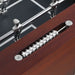 Zoomed-in view of dual abacus-style chrome scorekeeper set into the wood frame of the foosball table, for accurate and stylish goal tracking.