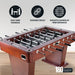 Foosball table with icons highlighting easy-grip handles, durable build quality, and smooth gameplay performance; includes 180-day limited warranty badge.