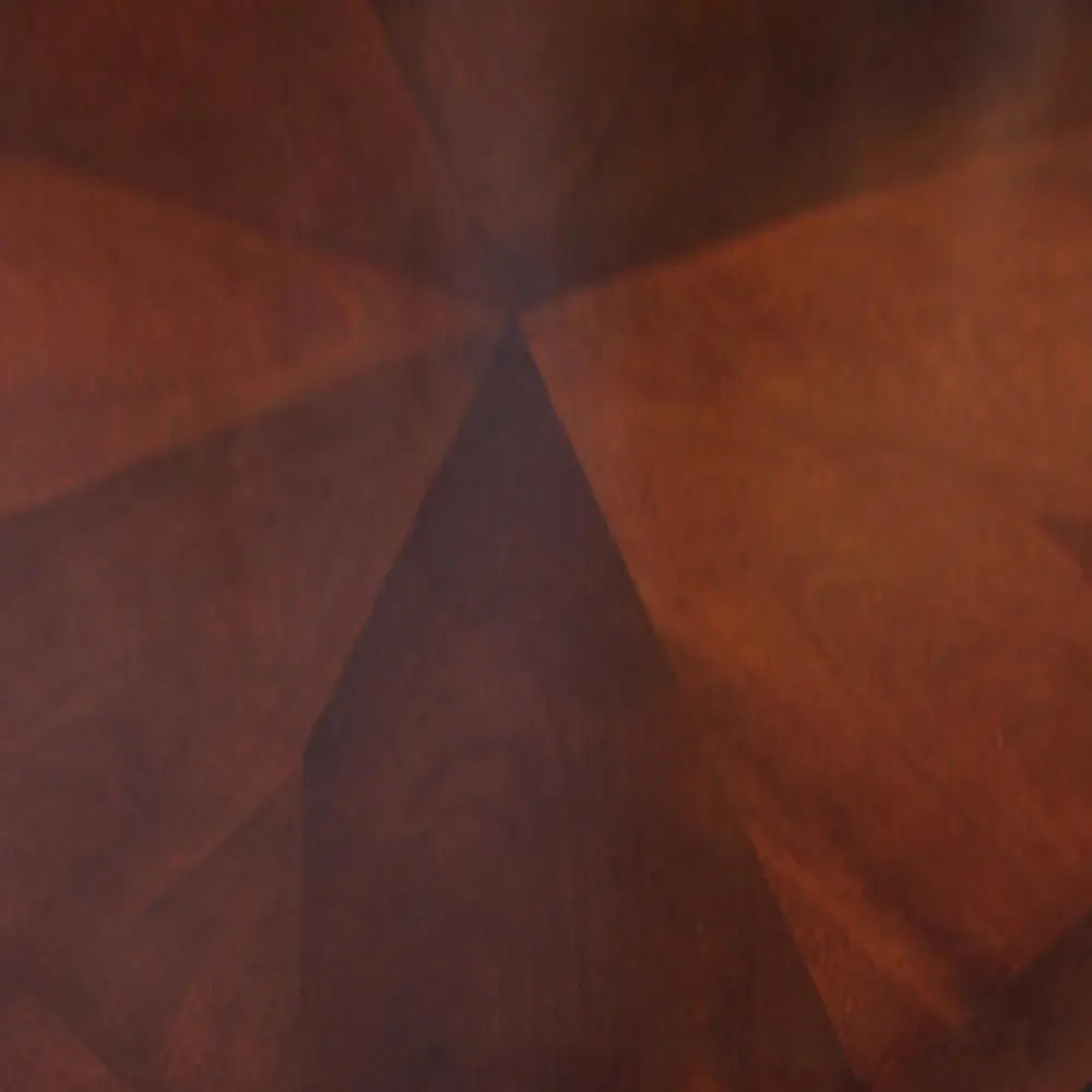 Close-up of Kingston dark oak tabletop wood grain with starburst veneer pattern, designed for reversible use in dining or gaming configurations.