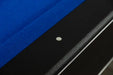 Close-up of Hathaway Hustler pool table's black top rail with embedded white sight dot and vibrant blue blended felt surface, designed for accurate aiming and smooth ball roll.