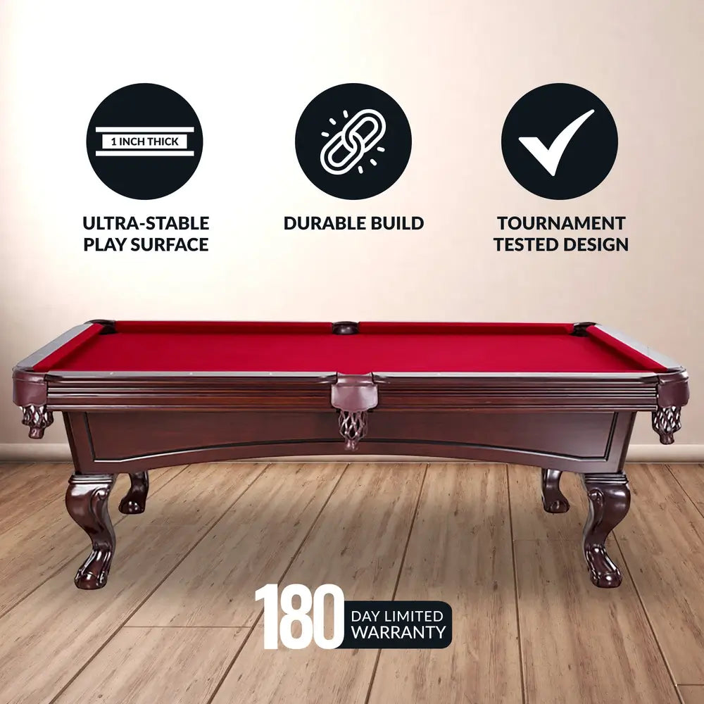 Close-up of Hathaway Augusta pool table showing 4.5-inch solid maple hardwood rails, inlaid diamond sights, K-66 gum rubber cushions, and red felt playfield