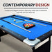 Hathaway Fairmont 6-ft Portable Pool Table featuring sleek matte black melamine rails, vibrant blue felt, and a complete accessory set arranged on the tabletop for modern game room appeal.
