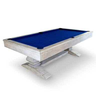 Angled product view of the Montecito 8‑ft pool table in distressed driftwood finish and navy blue felt, showcasing its elegant dual pedestal base.
