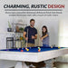 Lifestyle image of a couple playing on the Hathaway Montecito  pool table with blue felt and distressed driftwood finish, showcasing rustic farmhouse design in a cozy home setting.