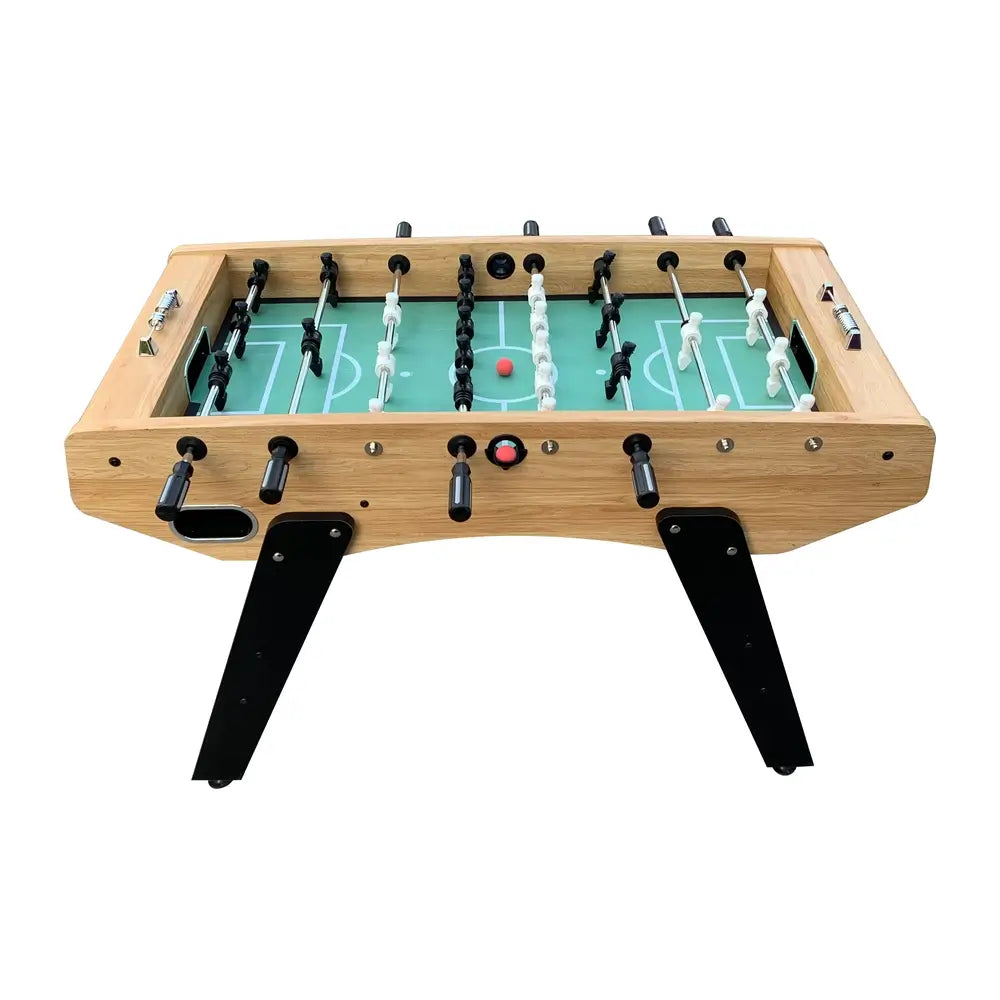 Backside of foosball table with curved apron design, 3-player goalie setup, black handles, and central red ball on green playfield.