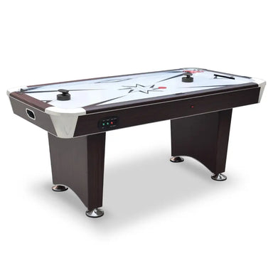 Modern air hockey table with dark cherry wood cabinet and chrome accents, featuring a white playfield with starburst graphics, two black pushers, two red pucks, and electronic controls on the side panel. Sturdy pedestal-style legs with chrome leg levelers enhance balance and stability.