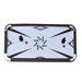 Top-down view of an air hockey table with a white starburst playfield design, two black ergonomic strikers, and two red pucks. Table features dark wood rails and chrome corners for a modern arcade look.