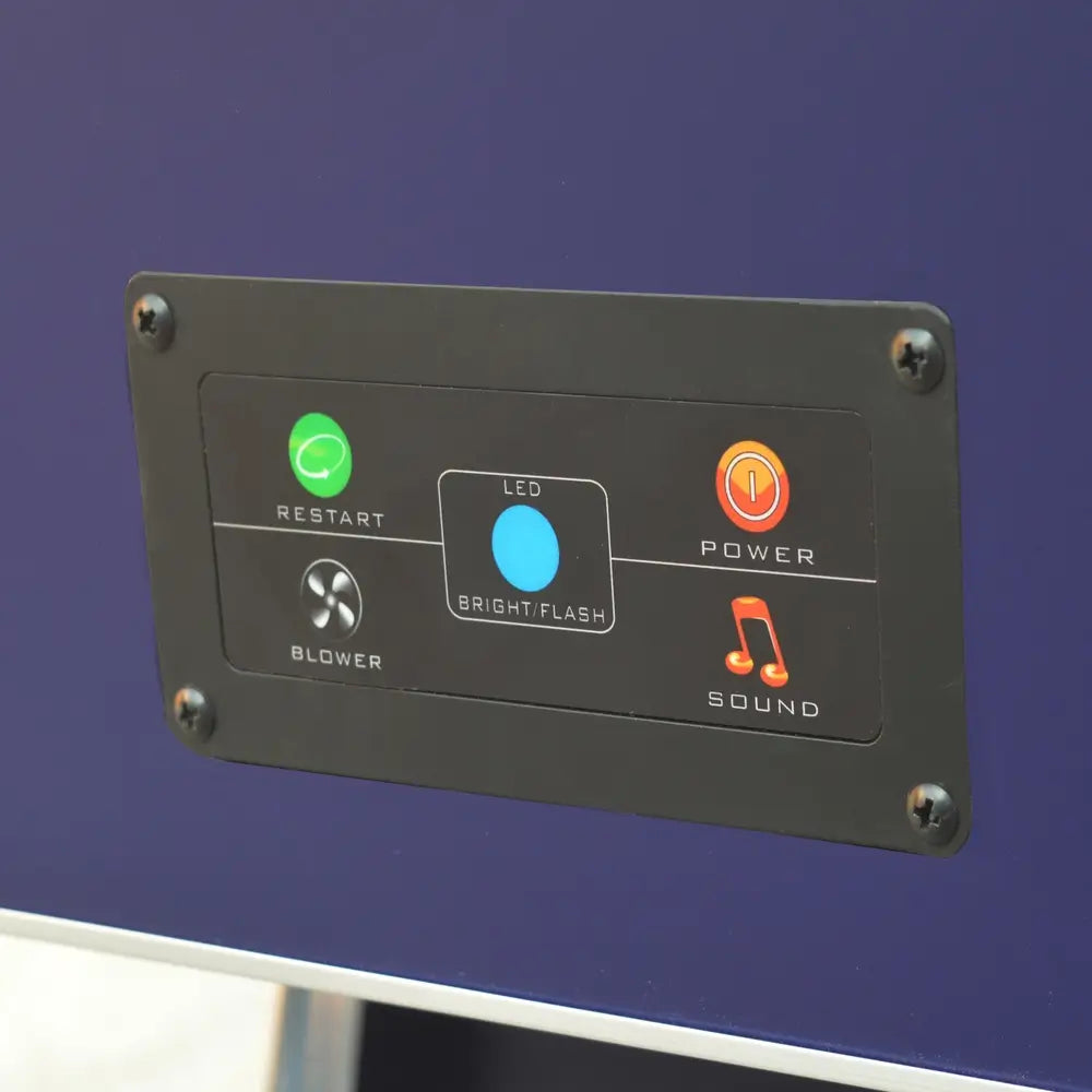 Close-up of the control panel on the Phantom II air hockey table. Features labeled buttons for restart, LED light brightness/flash, power, blower, and sound. Panel embedded in the blue cabinet side panel.