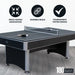Hathaway game table in table tennis mode on wood flooring, with feature icons emphasizing space-saving design, durable build, and tournament-tested quality, plus 180-day warranty.