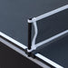 Detailed view of black and white mesh net system clipped onto the table tennis surface of a convertible game table, showing durable post and elastic attachment.
