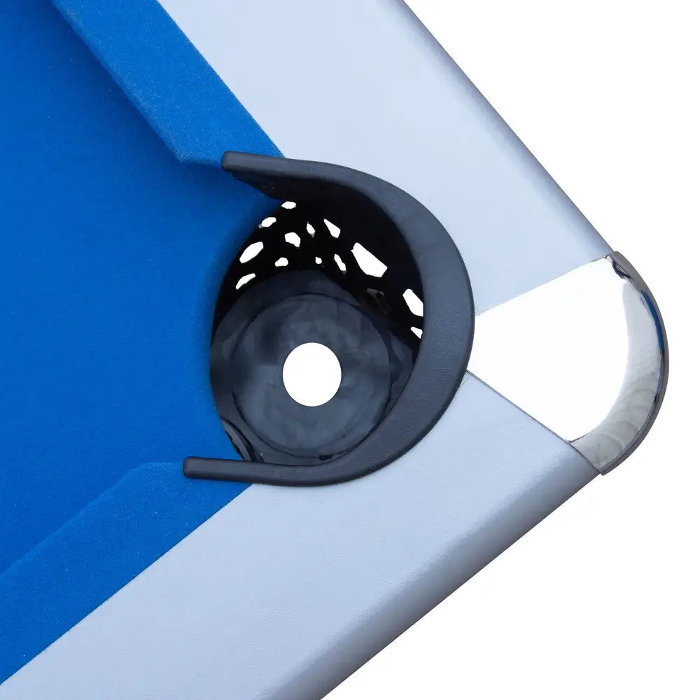Corner pocket close-up of Hathaway pool table featuring blue felt, chrome-plated corner cap, and black mesh-style drop pocket for ball collection.