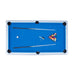 Top-down view of Hathaway pool table with racked billiard balls, two cue sticks, a cue chalk, and a table brush on vibrant blue felt surface with six drop pockets.