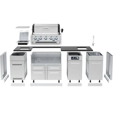 An exploded component diagram of the Broil King Imperial QS 590iE Smart Grill Island, showing individual stainless steel cabinets, grill head, rotisserie burner, sink, and accessories before assembly, on a white background.