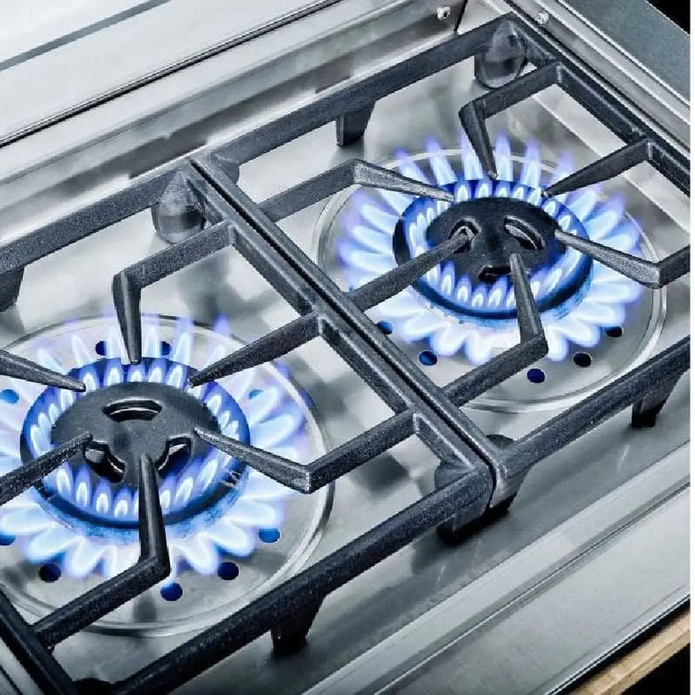Close-up of the Broil King Imperial S200 double side burner's slide-out stainless steel grease drip tray for easy cleaning.