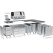 Modular assembly view of a Broil King L-shaped outdoor kitchen island with stainless steel cabinets, black countertop, and QS 690i smart grill.