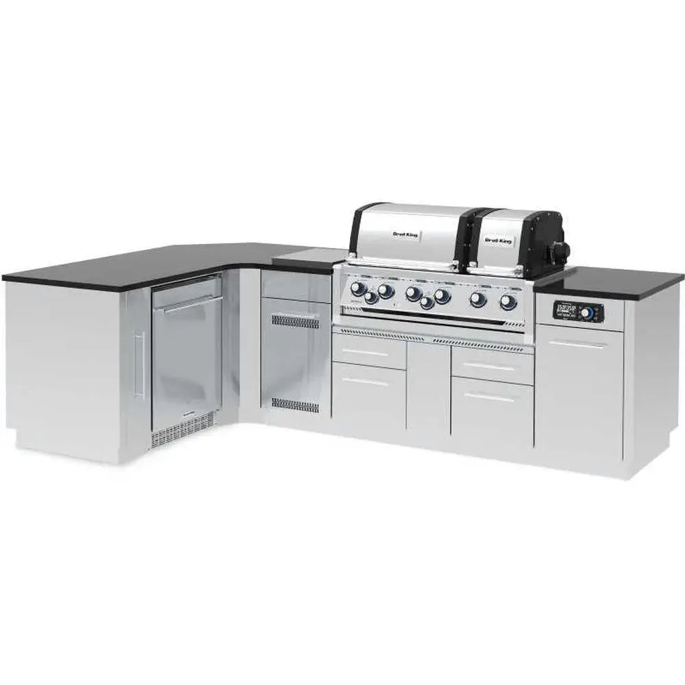 Fully assembled Broil King L-shaped stainless steel BBQ island with a black countertop and integrated Imperial QS 690i smart grill.
