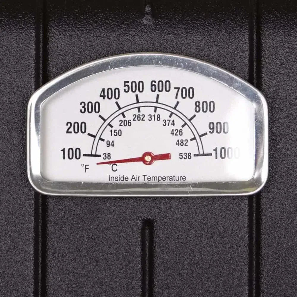 Close-up view of the accurate temperature gauge on the Broilmaster  grill hood, showing Fahrenheit and Celsius scales