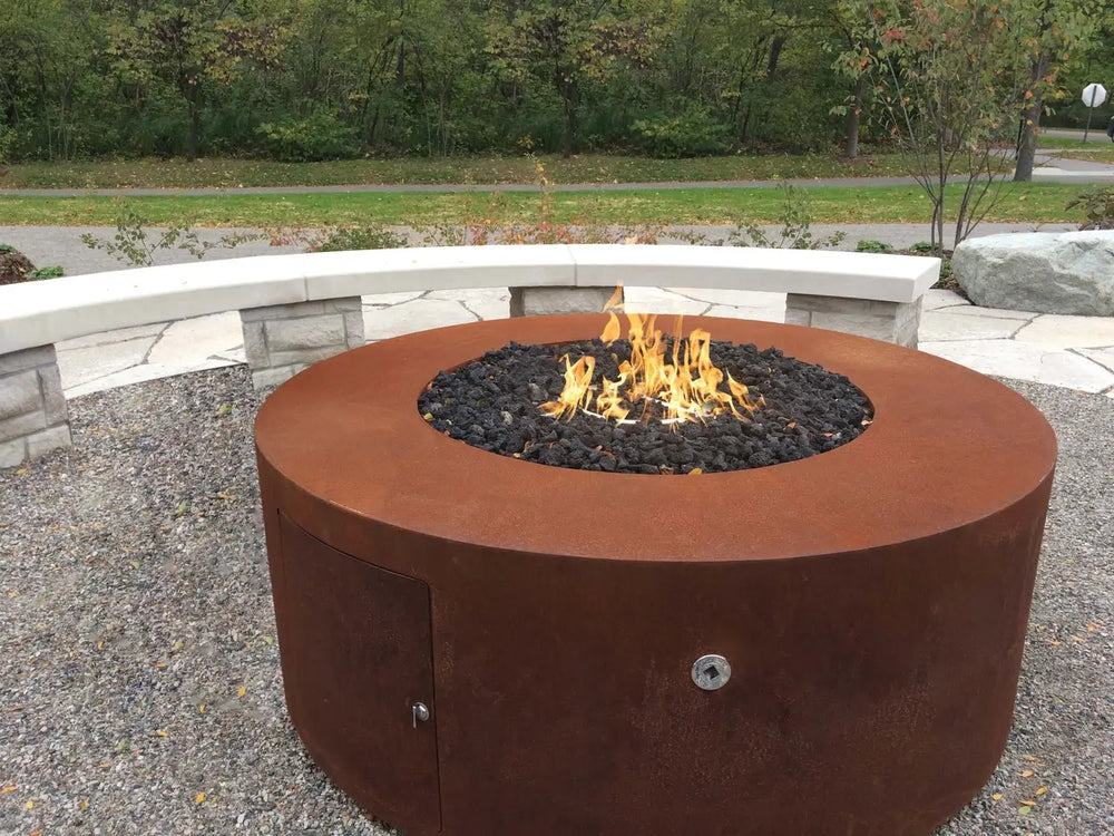The Outdoor Plus Unity Fire Pit – 24" Tall Round Corten Steel Lifestyle