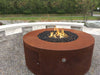 The Outdoor Plus Unity Fire Pit – 24" Tall Round Corten Steel Lifestyle