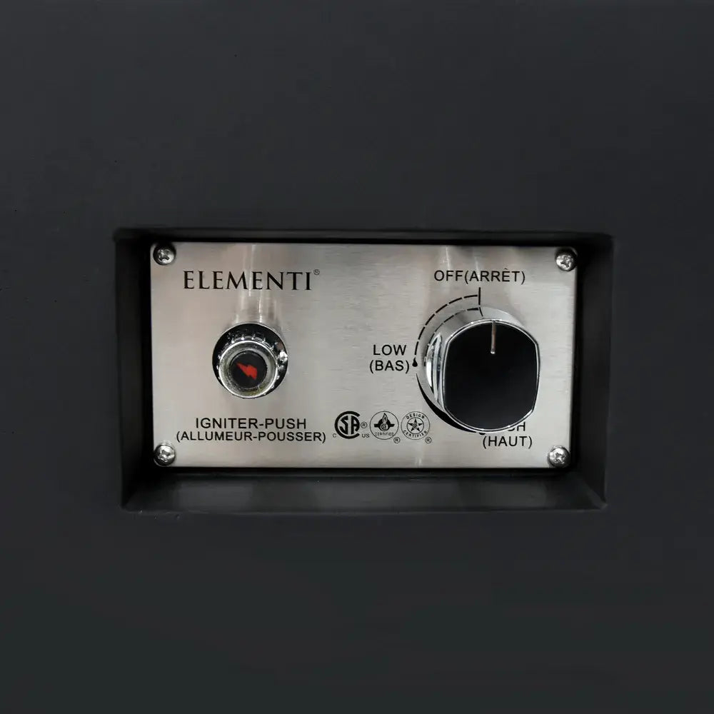Detail of the Elementi fire table control panel with a push-button ignition and adjustable gas flow knob.