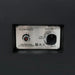 Detail of the Elementi fire table control panel with a push-button ignition and adjustable gas flow knob.