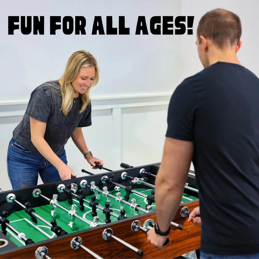 Video cover featuring players smiling while using the Avenger 56-inch foosball table with bold title text.