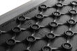 Close-up of patented cast iron Le Griddle cooking plate design for even heat distribution.