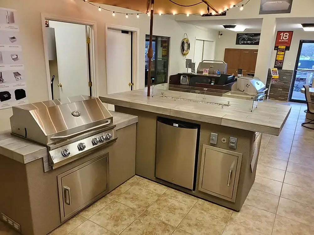 KoKoMo Baja BBQ island with raised bar in showroom setting
