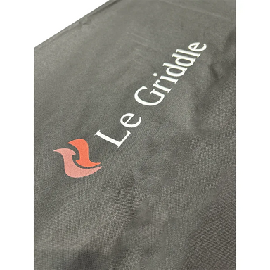 Close-up of Le Griddle black vinyl lid cover with logo