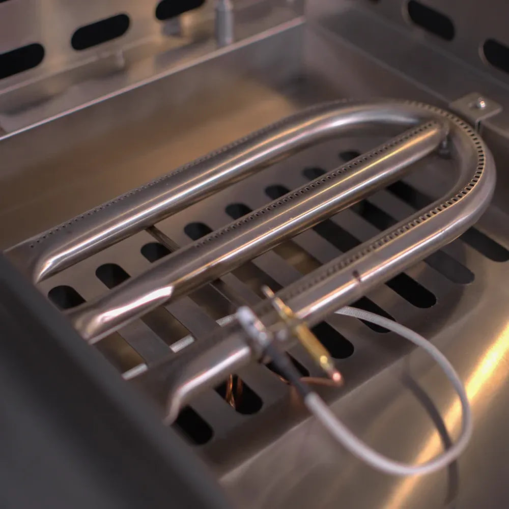 Close-up of Le Griddle OML105P3 gas burner assembly and stainless interior