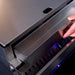 Close-up of Le Griddle OML40P3 removable grease tray on stainless gas griddle