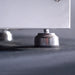 Close-up of Le Griddle OML105C3 adjustable stainless steel leveling foot