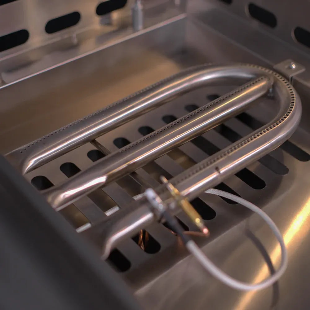 Close-up of Le Griddle OML105P6 gas burner assembly and stainless interior