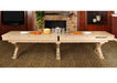 Freetime Fun Rockford Rustic Oak 14-foot shuffleboard table converted into a dining buffet table with food in a rustic game room.