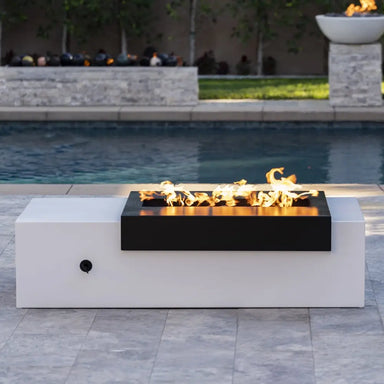 The Outdoor Plus Moonstone Fire Pit – Black & White Front View near Swimming pool