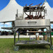 Tagwood BBQ23SS XL Santa Maria grill cooking large tomahawk steaks at outdoor BBQ event
