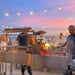 Tagwood BBQ06SS Santa Maria grill cooking at beachside barbecue event at sunset